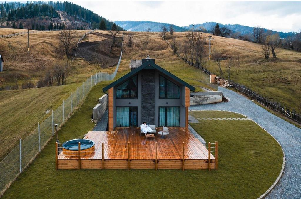 an aerial view of a house with a deck at Sadova Chalet in Sadova
