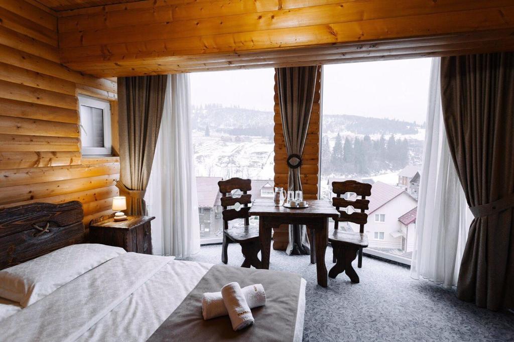 Postel nebo postele na pokoji v ubytování Hotel Marilen