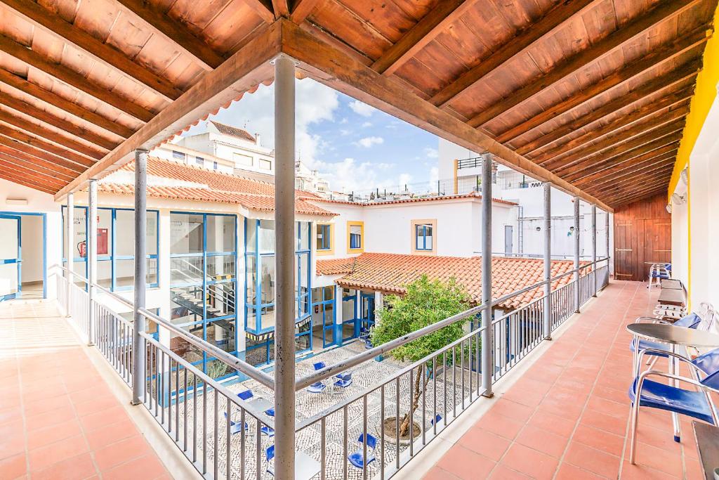 an outdoor balcony with a view of a building at HI Lagos - Pousada de Juventude in Lagos
