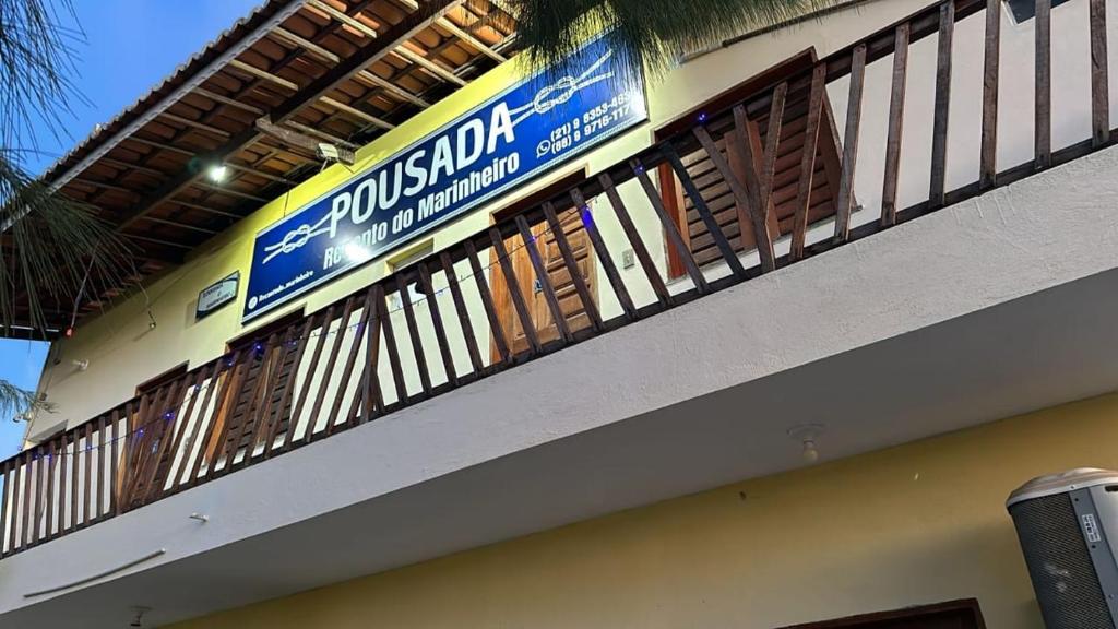 a sign on the side of a building at Pousada Recanto do Marinheiro in Aracati