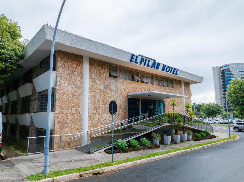 a building with a sign that reads ethical hotel at Hotel El Pilar by Bsb Inn in Brasília