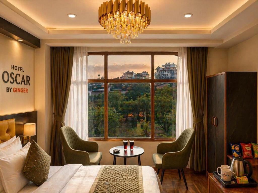 a hotel room with a bed and a large window at Hotel Oscar By Ginger Hotels Chain Near Club House Road Manali Luxury Rooms Best Hotel In Manali !!!!! in Manāli