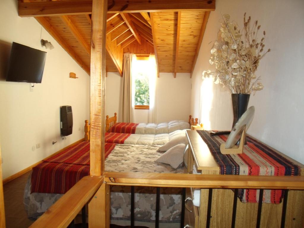 TV a/nebo společenská místnost v ubytování Colibrí House