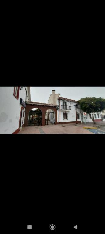 a building on a street in front of a building at Hospedaje por 7 días 15 dias o Mes in La Serena