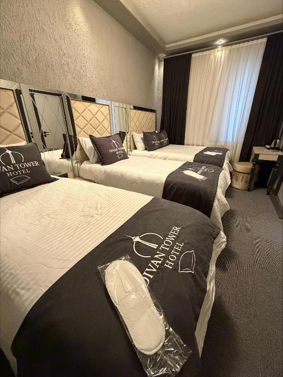 Divan Tower Otel - Quadruple Room