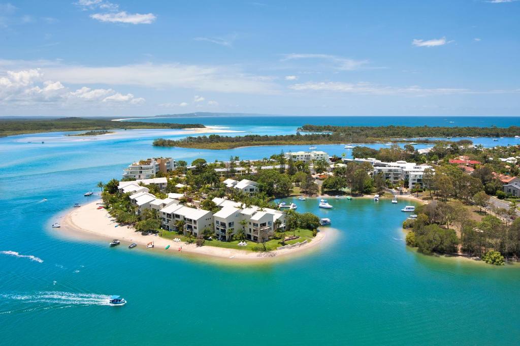 an aerial view of an island in the water at Culgoa Point Beach Resort in Noosa Heads