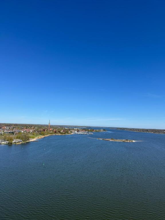 an aerial view of a large body of water at Inselblick 3 in Schleswig