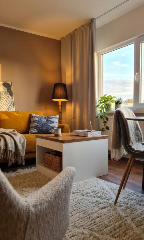 a living room with a couch and a table at PAE korter Kärdlas in Kärdla
