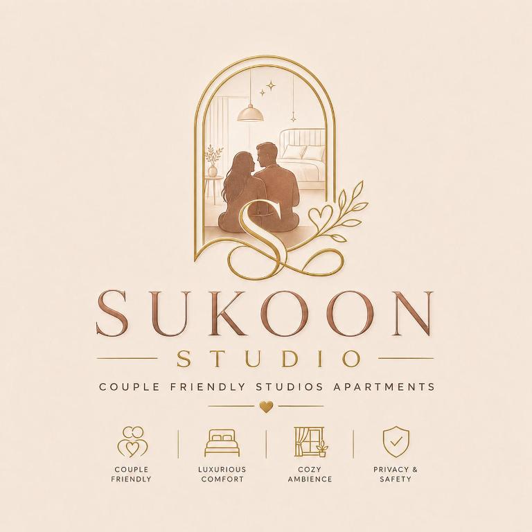 a logo for a studio with a couple in a window at Sukoon studios in Ghaziabad