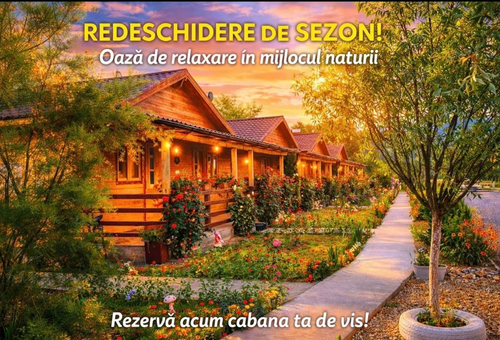 a house with a garden in front of it at La Podul Gornii in Gornea