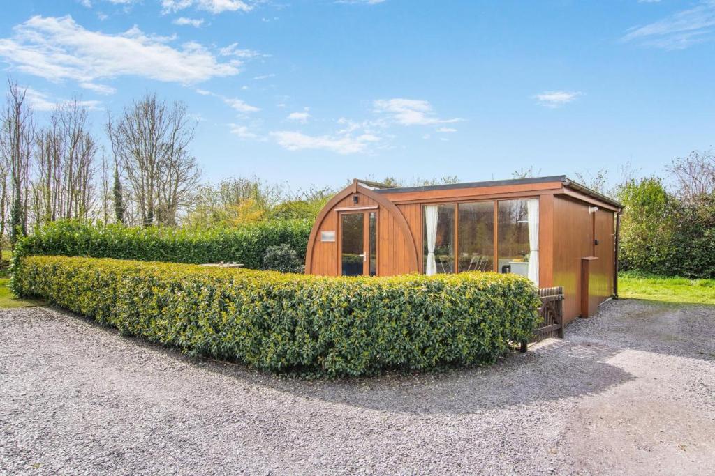 a house with a bush in front of it at 1 Bed in Barnacre oc-b34349 in Catterall