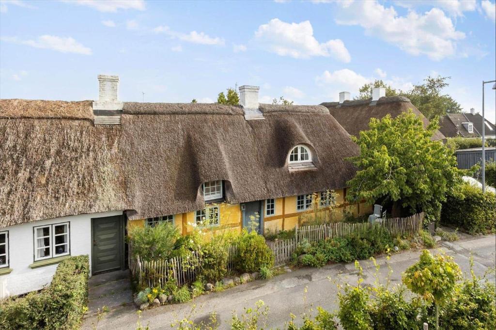 an old thatched house with a thatched roof at AE326-Marstal-Pers-Bro-6 in Marstal