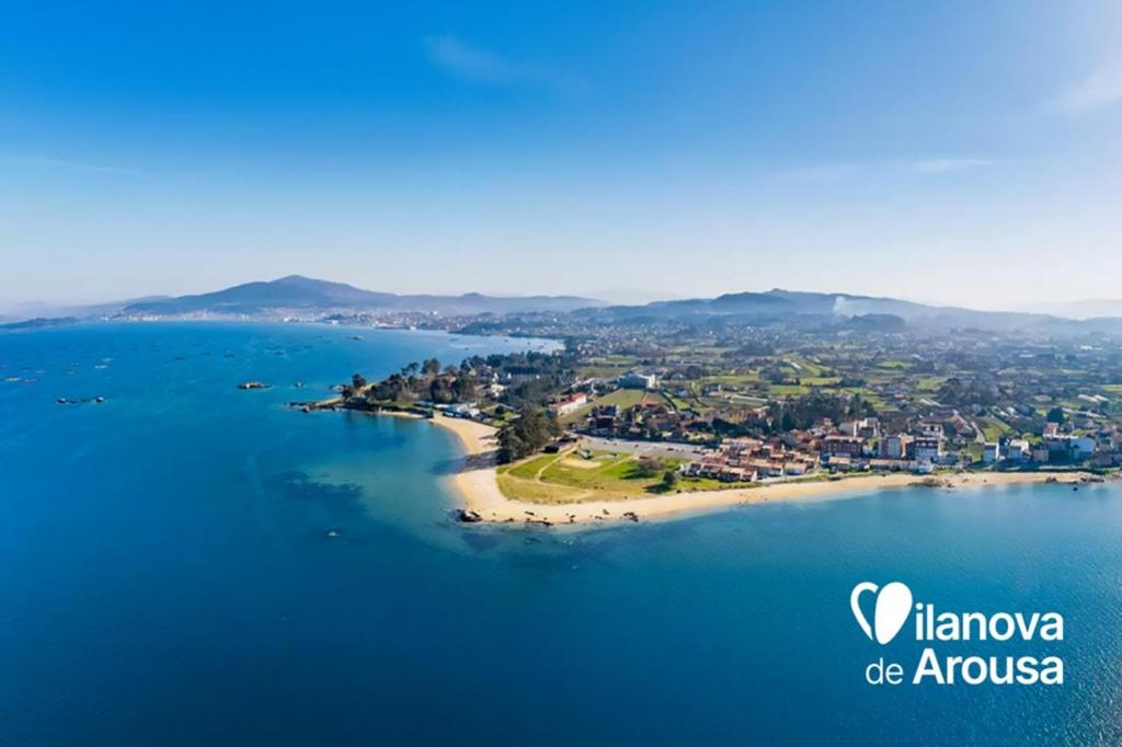 an island in the middle of a body of water at APARTAMENTOS LA CAPILLA in Villanueva de Arosa