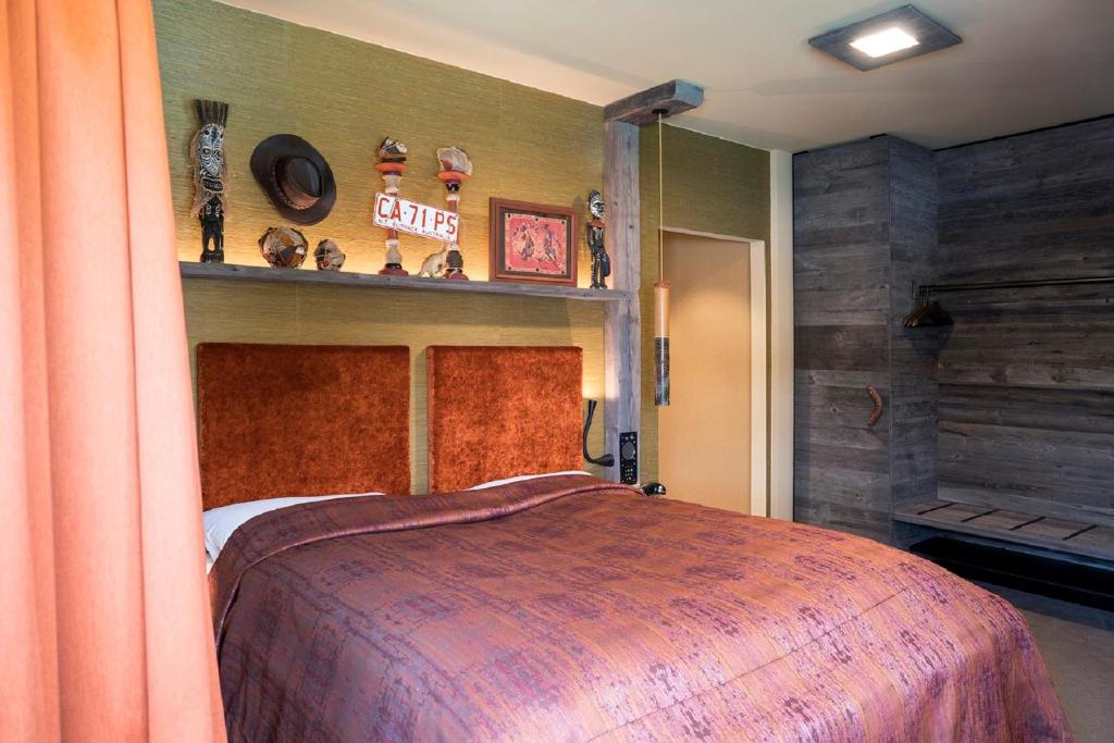 Postel nebo postele na pokoji v ubytování Boutique Hotel im Auracher Löchl