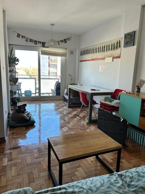 a living room with a ping pong table in it at Cálido y luminoso hogar in Vicente López