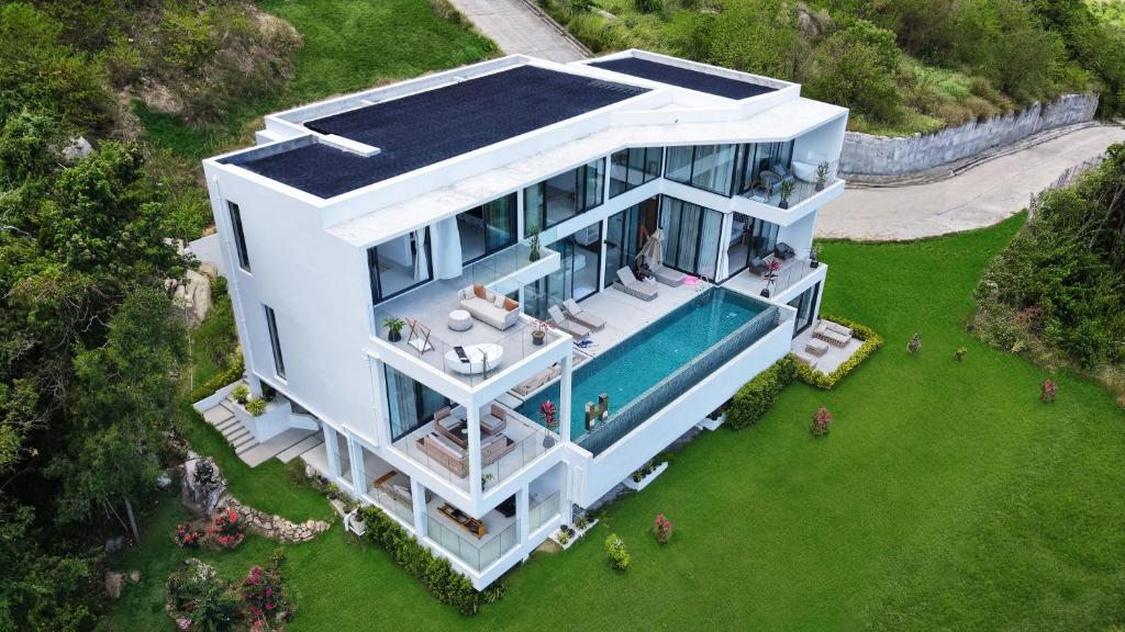 an aerial view of a house with a pool at Mountain Top Villa in Bophut