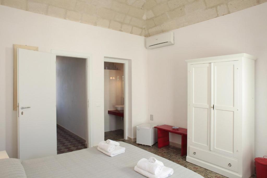Postel nebo postele na pokoji v ubytování B&b Il Tufo