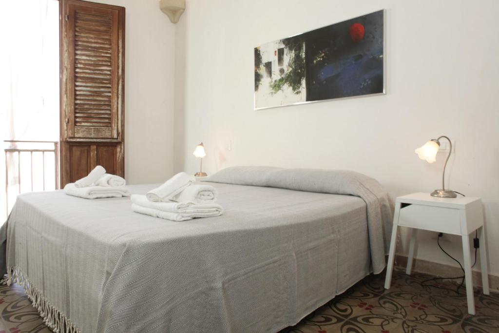 Postel nebo postele na pokoji v ubytování B&b Il Tufo
