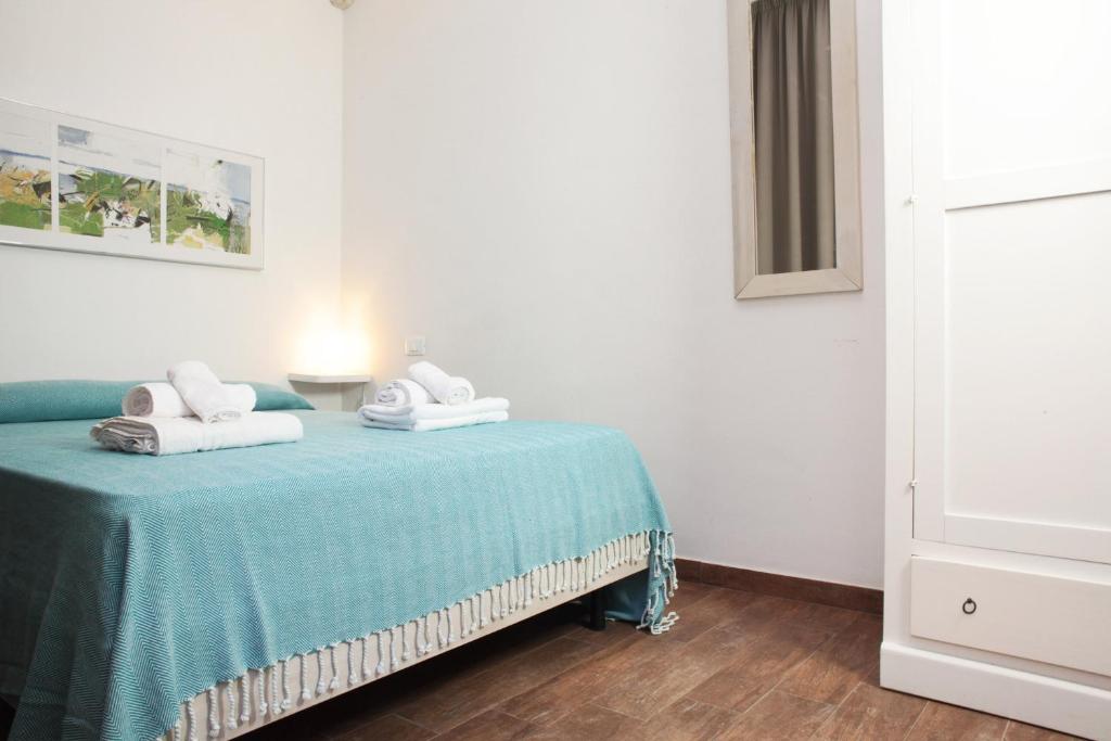Postel nebo postele na pokoji v ubytování B&b Il Tufo