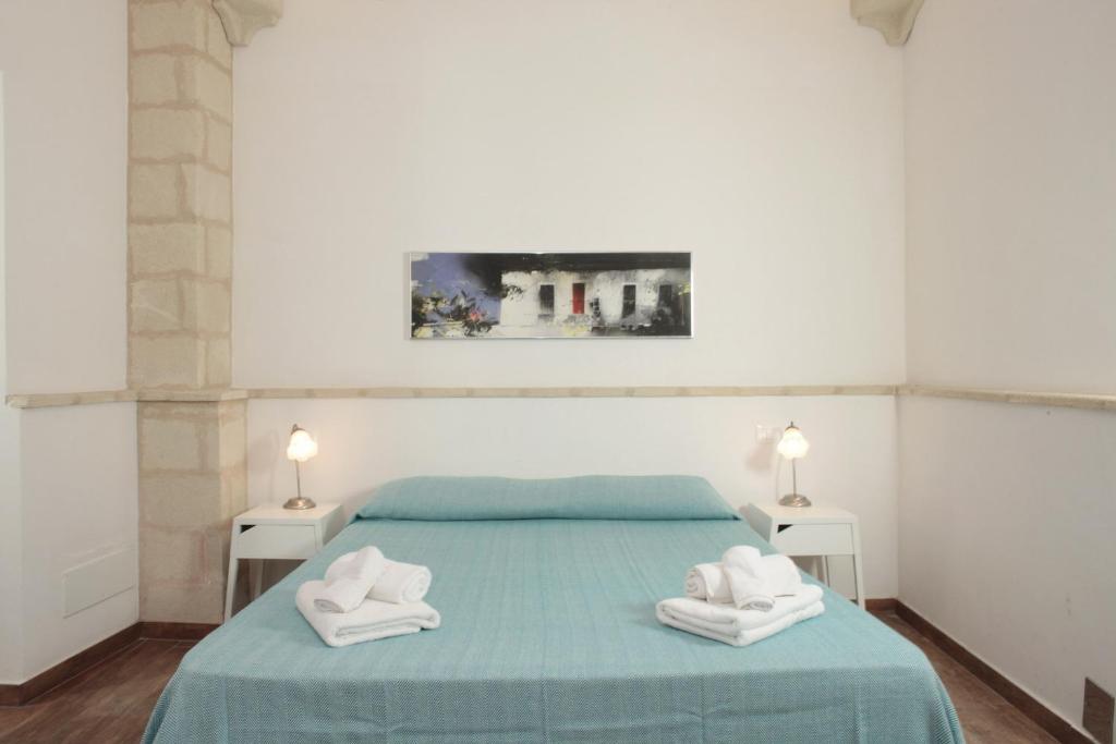 Postel nebo postele na pokoji v ubytování B&b Il Tufo