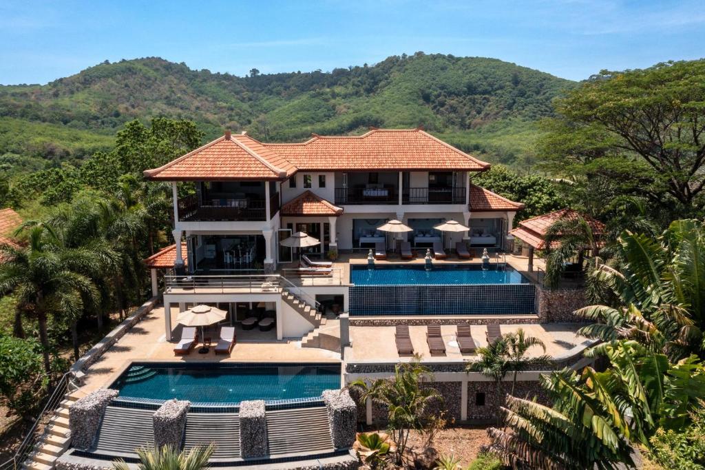 an aerial view of a villa with a swimming pool at 2 Pools And Seaview! Villa Serena 6Br, Klong Khong in Ko Lanta