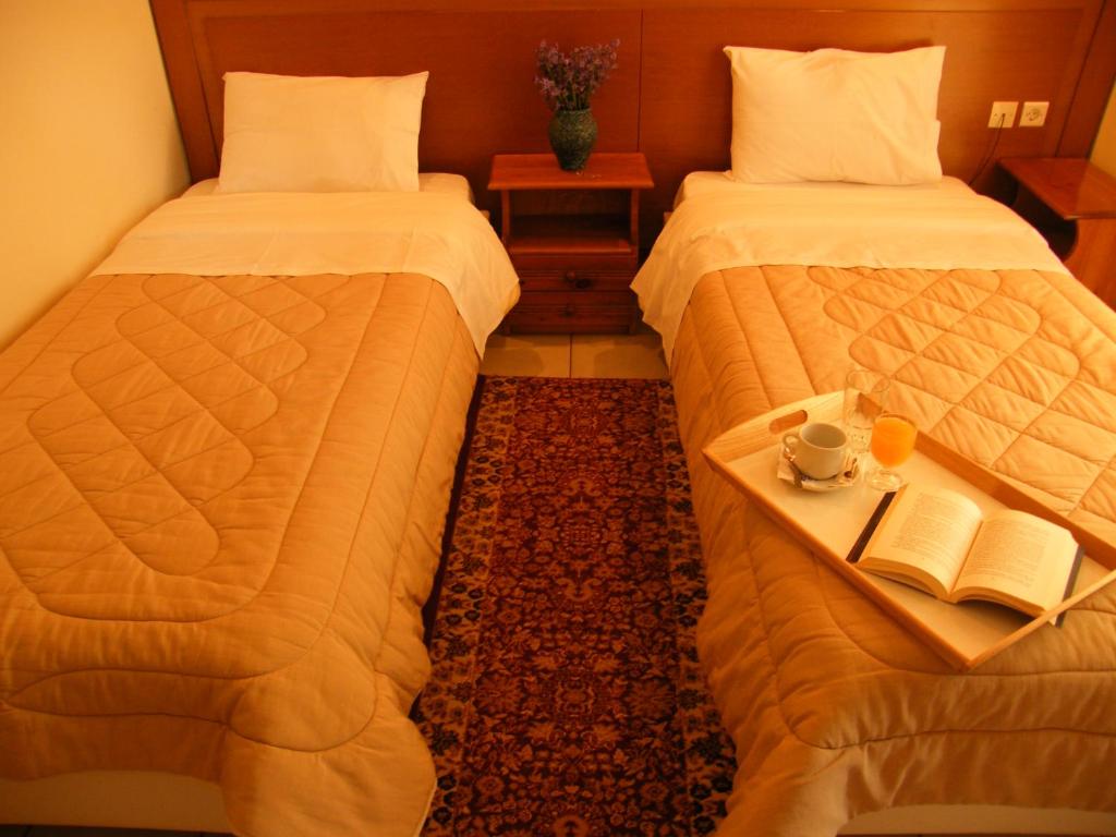 Letto o letti in una camera di Ξενοδοχείο Αφροδίτη- Hotel Aphrodite