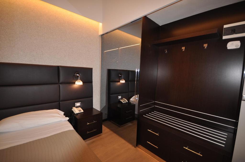 Postel nebo postele na pokoji v ubytování Hotel Adriatic&Beauty