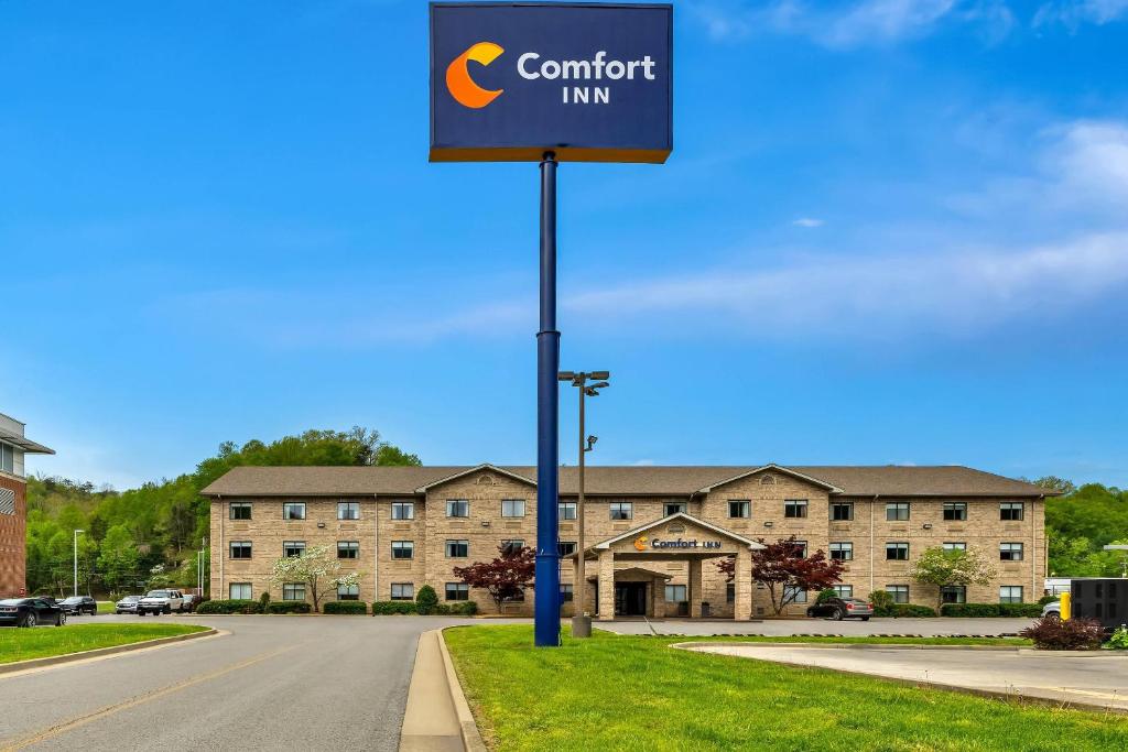 a sign for a comfort inn in front of a building at Comfort Inn Pikeville in Pikeville