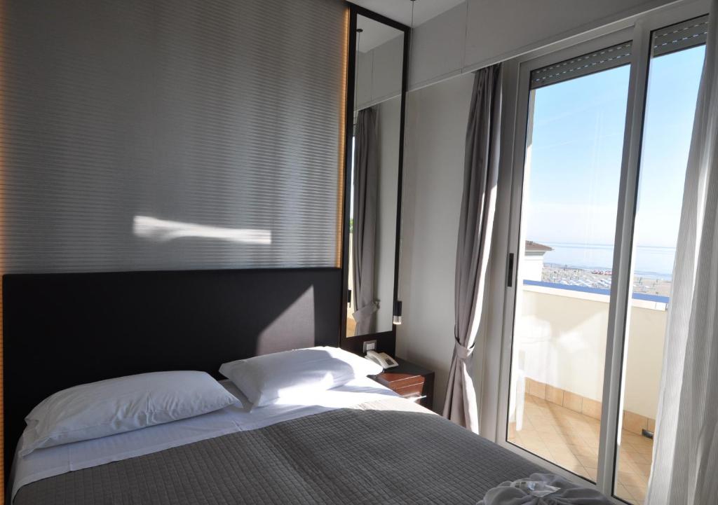Postel nebo postele na pokoji v ubytování Hotel Adriatic&Beauty