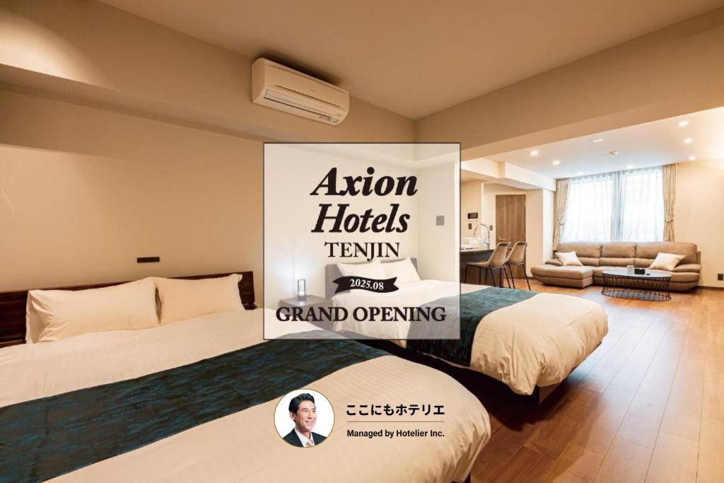 a hotel room with two beds and a sign on the wall at Axion Hotels Tenjin in Fukuoka