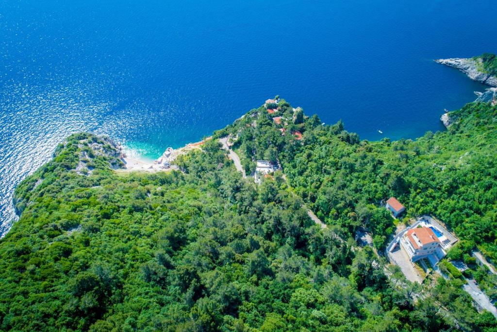 an aerial view of a small island in the water at Villa Pia by Briskva in Brseč