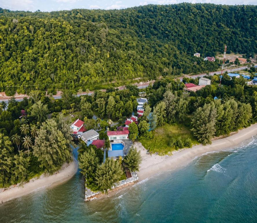 an aerial view of an island in the water at Barn Talaepu Resort in Ban Suan Khat