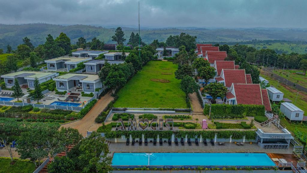 an aerial view of a resort with a swimming pool at Pidoma Resort by EHM in Senmonorom