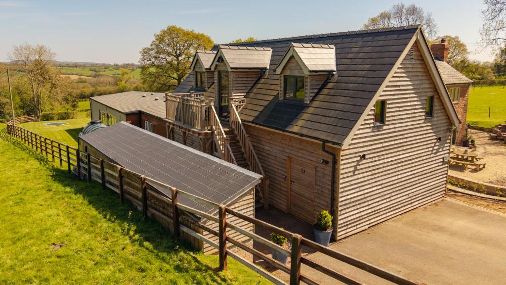 an overhead view of a house with solar panels on it at Ferny Retreat in Bromyard