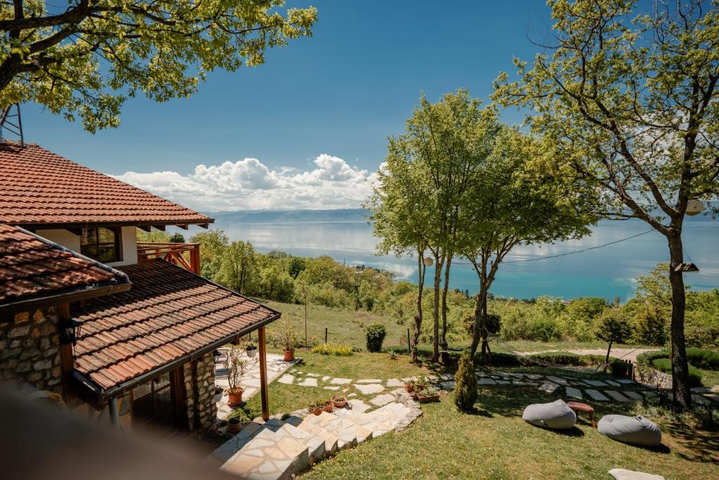 a house with a view of the water at Paradise Nest in Ohrid