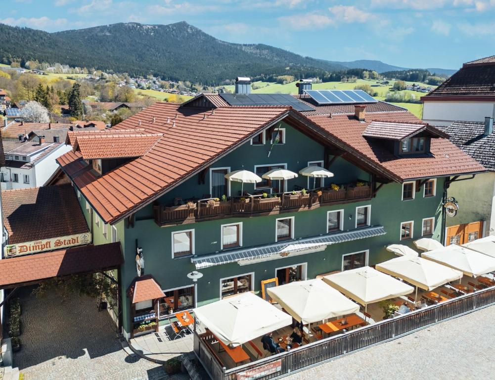 an aerial view of a building with red roof at Bayerische Gastwirtschaft Dimpfl-Stadl in Lam