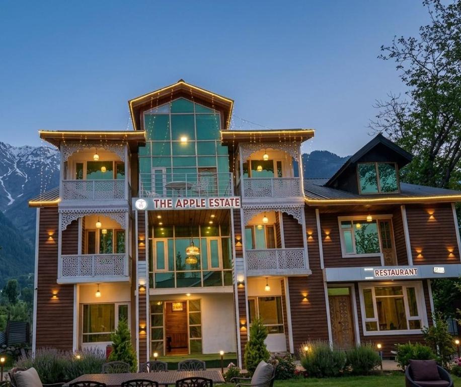 a large building with a sign that reads the apartment at Hotel The Apple Estate in Pahalgām