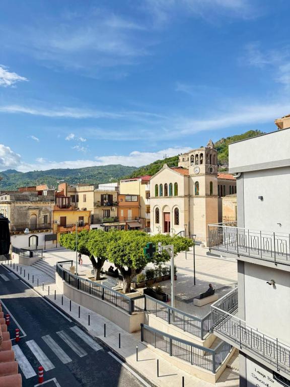 a view of a town from a building at Etna Terrace Casa Lidia in Gaggi