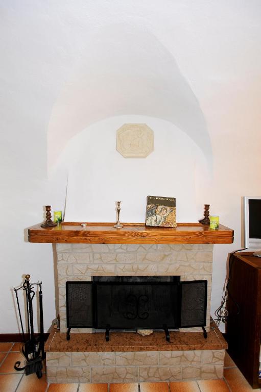Telewizja i/lub zestaw kina domowego w obiekcie Panoramic Apartment with Balcony and Terrace