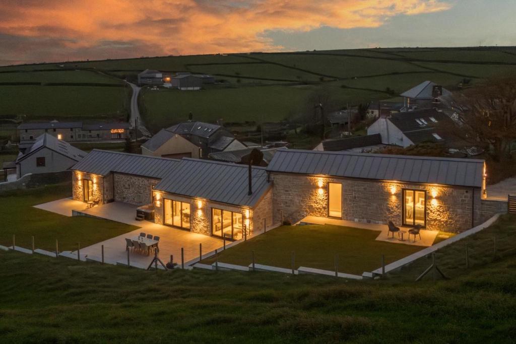an aerial view of a house with lights at 3 Bed in Wendron oc-w29093 in Wendron