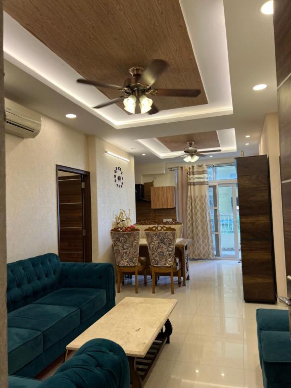 a living room with a couch and a table at Casa Luxoria in Jalandhar