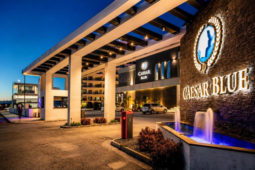 a large building with a sign that reads crepes blue at Caesar Blue Collection Nothern Cyprus whith Bedroom Residences in Ayios Dhometios