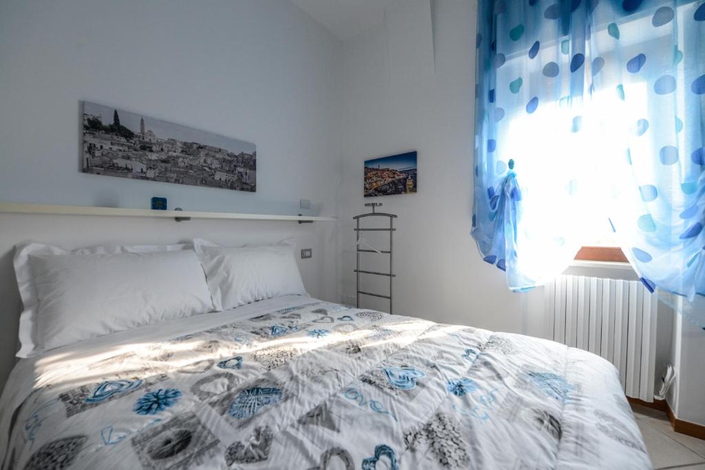 Postel nebo postele na pokoji v ubytování Uno Sguardo Sui Sassi