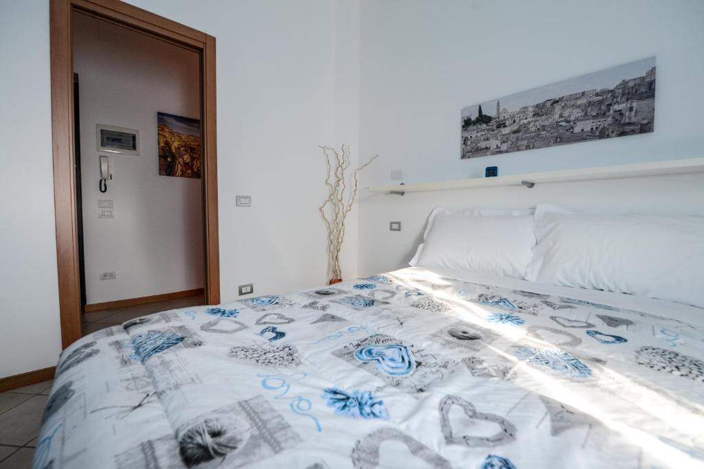 Postel nebo postele na pokoji v ubytování Uno Sguardo Sui Sassi