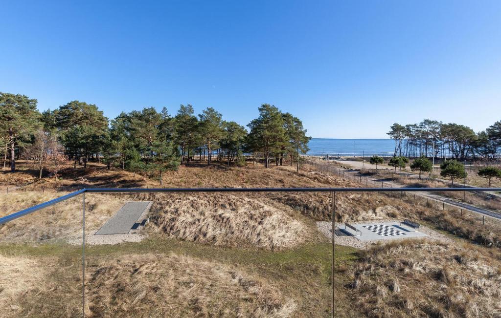 a skateboard ramp on a hill next to the ocean at Prince in Binz