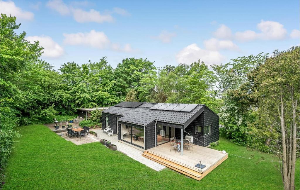 an overhead view of a black house with a deck at Holiday Home Højdevej in Vejby