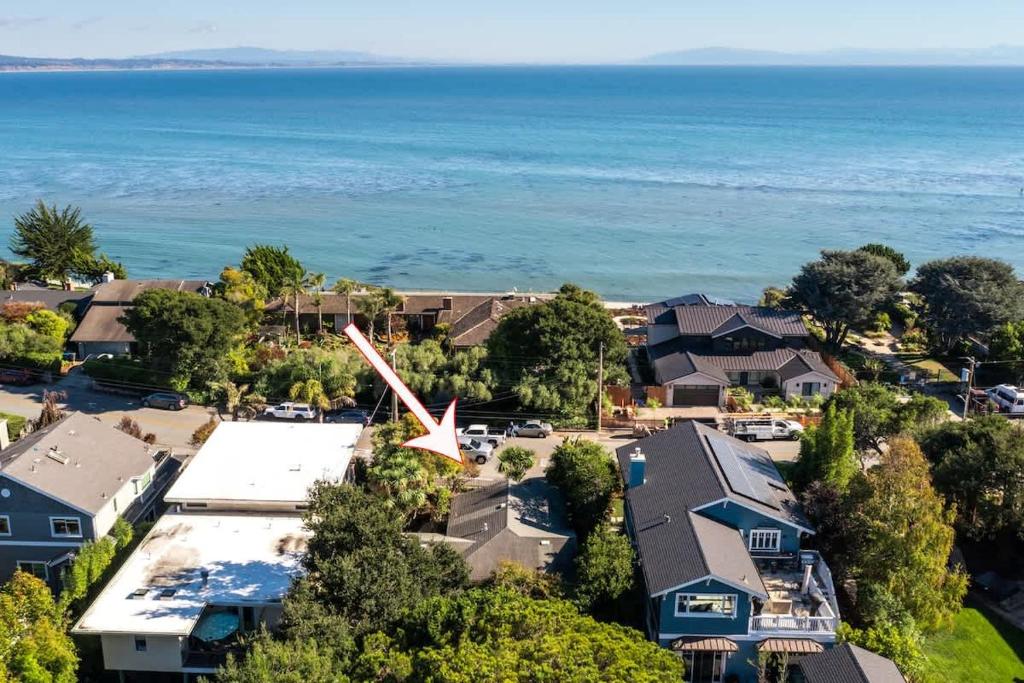 an aerial view of a town with houses and the ocean at Coastal Charm in Santa Cruz