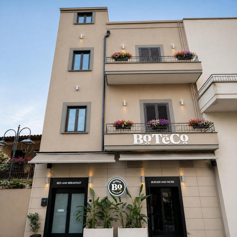 a building with a rocooco sign on it at Boteco B&B in Bacoli