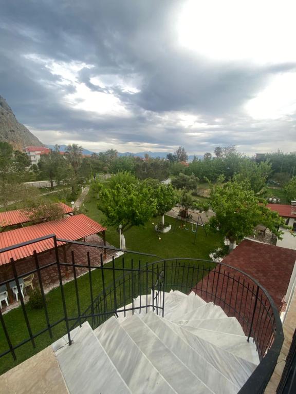 a view of a park from the balcony of a building at Apartments MOYRKOS in Missolonghi