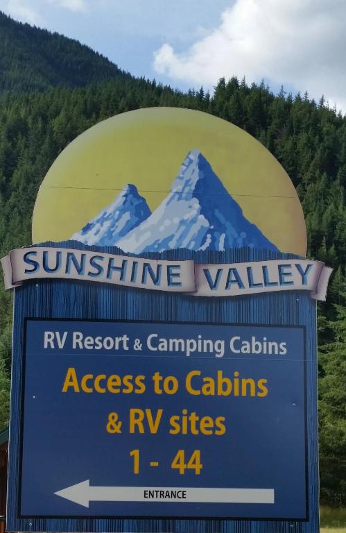 a sign for the suntec valley rv resort and camping castles and rv at Sunshine Valley RV Resort and Cabins in Sunshine Valley